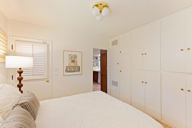 756 Linda Vista Ave, Pasadena, CA 91103 - bedroom with a textured ceiling and a closet