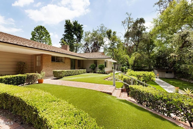 756 Linda Vista Ave, Pasadena, CA 91103 - view of grassy yard with an outbuilding