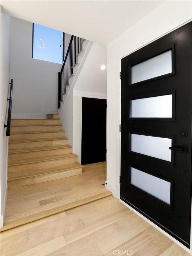 5633 E Deborah St, Long Beach, CA 90815 - foyer featuring stairway, wood finished floors, and recessed lighting