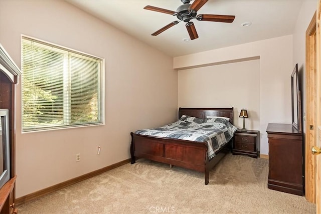 1053 Lausanne Dr, Crestline, CA 92325 - bedroom with multiple windows, light colored carpet, baseboards, and a ceiling fan