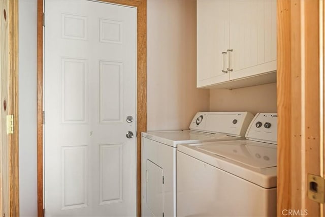 1053 Lausanne Dr, Crestline, CA 92325 - washroom featuring washing machine and dryer and cabinet space