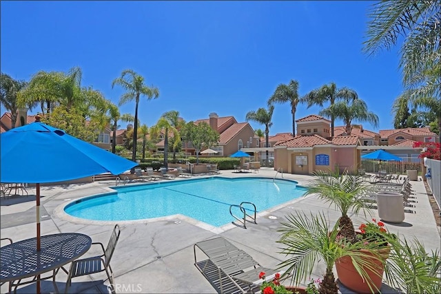 48 Via Athena, Aliso Viejo, CA 92656 - community pool featuring a patio area and a residential view