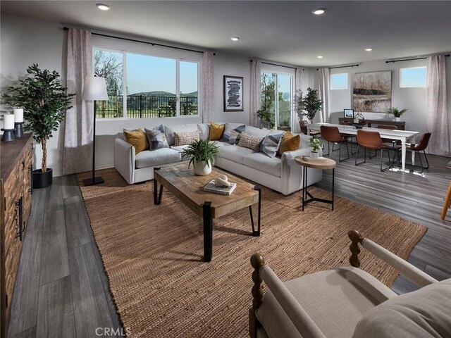 35231 Lopez Ln, Beaumont, CA 92223 - living room featuring plenty of natural light, wood finished floors, and recessed lighting