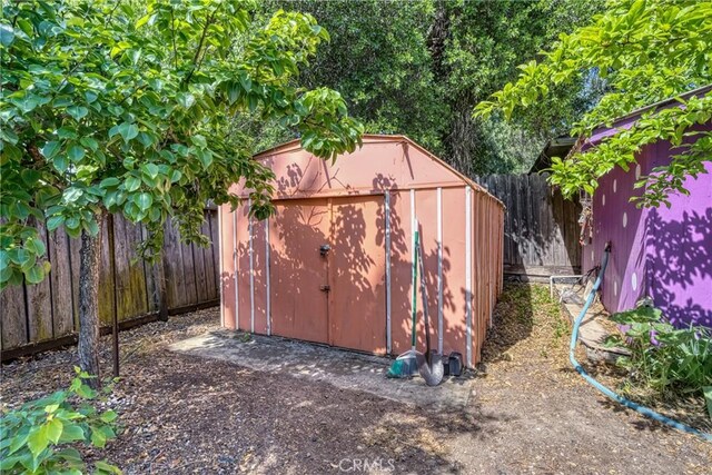 3595 Vista St, Clearlake, CA 95422 - view of shed with a fenced backyard