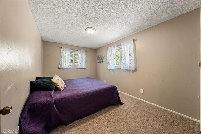 3595 Vista St, Clearlake, CA 95422 - bedroom with carpet, a textured ceiling, and baseboards