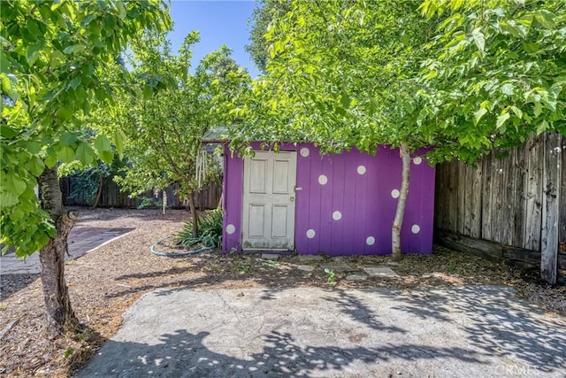 3595 Vista St, Clearlake, CA 95422 - fenced backyard with a storage shed and an outdoor structure
