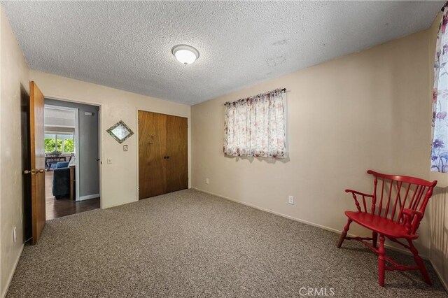 3595 Vista St, Clearlake, CA 95422 - unfurnished room featuring carpet floors, a textured ceiling, and baseboards