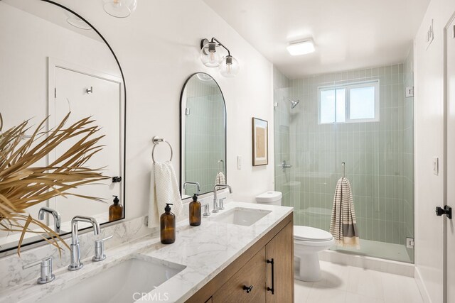 2049 Wickshire Ave, Hacienda Heights, CA 91745 - full bath with toilet, a shower stall, double vanity, and tile patterned floors