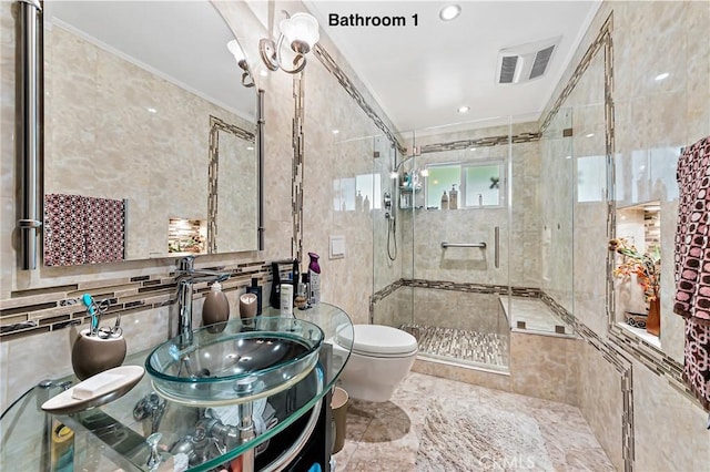 10500 Jordan Ave, Chatsworth, CA 91311 - full bathroom featuring toilet, tile walls, a shower stall, vanity, and ornamental molding