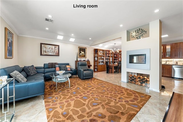 10500 Jordan Ave, Chatsworth, CA 91311 - living room with a chandelier, recessed lighting, and ornamental molding