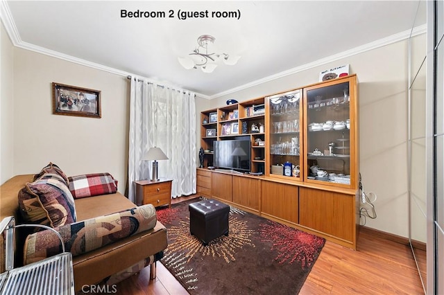 10500 Jordan Ave, Chatsworth, CA 91311 - sitting room with ornamental molding, light wood-type flooring, and baseboards