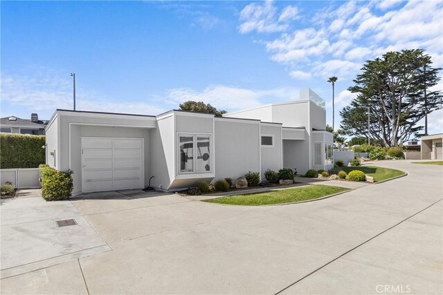 3080 Studio Dr, Cayucos, CA 93430 - view of front facade with a garage and driveway