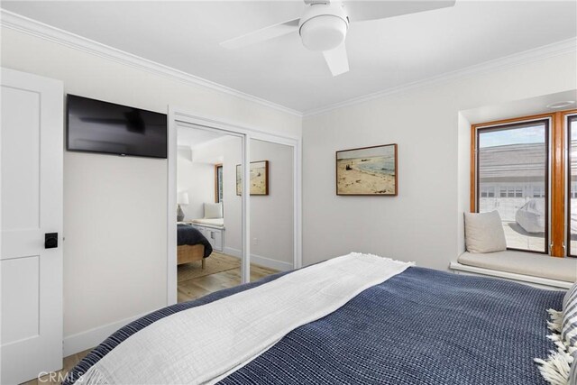3080 Studio Dr, Cayucos, CA 93430 - bedroom featuring crown molding, wood finished floors, baseboards, ceiling fan, and ensuite bath
