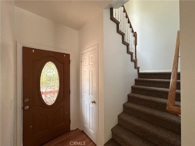 9345 Conifer Dr, Forest Falls, CA 92339 - entrance foyer featuring stairway and wood finished floors