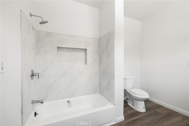 747 W 9th St, San Bernardino, CA 92410 - full bath featuring wood finished floors,  shower combination, toilet, and baseboards