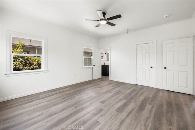 747 W 9th St, San Bernardino, CA 92410 - unfurnished bedroom featuring wood finished floors, baseboards, ornamental molding, and a ceiling fan