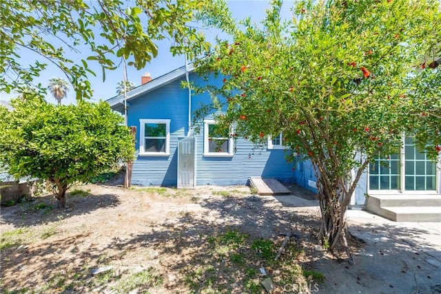 747 W 9th St, San Bernardino, CA 92410 - back of property featuring a chimney