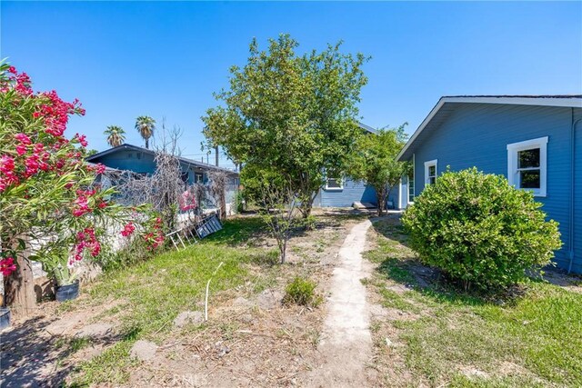 747 W 9th St, San Bernardino, CA 92410 - view of yard with driveway