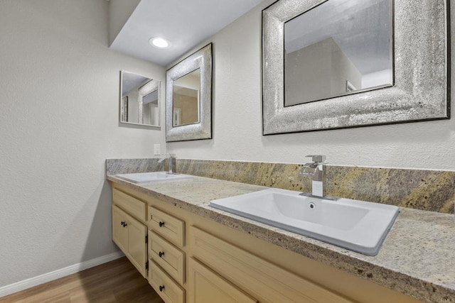 1561 Parkland Way, San Diego, CA 92114 - bathroom with double vanity and wood finished floors