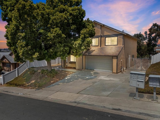 1561 Parkland Way, San Diego, CA 92114 - view of front of house featuring a garage, stucco siding, and concrete driveway