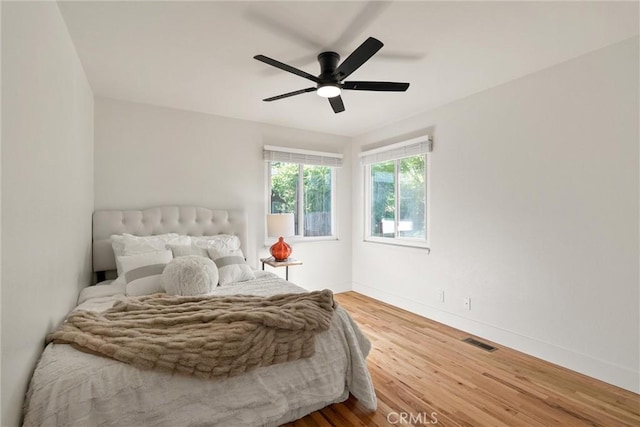 1105 Glenwood Ave, Chico, CA 95926 - bedroom featuring wood finished floors, baseboards, and ceiling fan