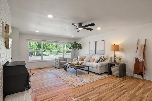 1105 Glenwood Ave, Chico, CA 95926 - living room featuring light wood-style flooring, baseboards, ceiling fan, and recessed lighting