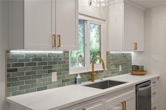 1105 Glenwood Ave, Chico, CA 95926 - kitchen with a sink, white cabinets, backsplash, and light countertops