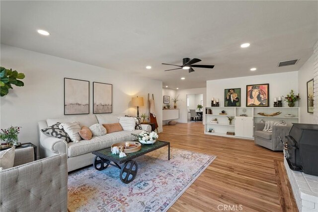 1105 Glenwood Ave, Chico, CA 95926 - living room featuring light wood-type flooring, ceiling fan, and recessed lighting