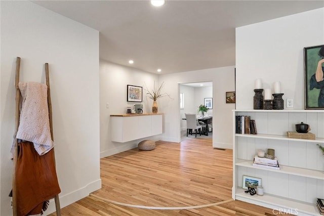 1105 Glenwood Ave, Chico, CA 95926 - corridor featuring recessed lighting, light wood-style flooring, and baseboards