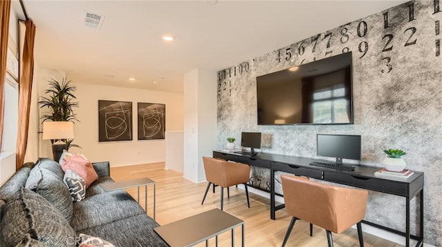 30025 Adrift Ln, Menifee, CA 92584 - office area with wood finished floors, an accent wall, and recessed lighting