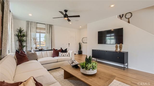30025 Adrift Ln, Menifee, CA 92584 - living area with wood finished floors, ceiling fan, and recessed lighting