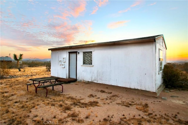 177 Cherokee Trl, Yucca Valley, CA 92284 - view of outdoor structure at dusk