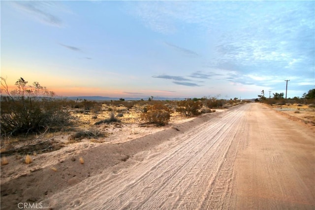 177 Cherokee Trl, Yucca Valley, CA 92284 - view of dirt / gravel road with a rural view