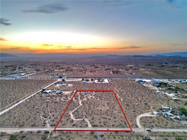 177 Cherokee Trl, Yucca Valley, CA 92284 - overview of rural landscape with mountains, a desert landscape, and property boundaries highlighted
