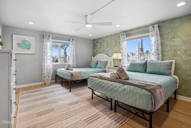3903 Ocean Dr, Oxnard, CA 93035 - bedroom featuring baseboards, wallpapered walls, recessed lighting, light wood-type flooring, and a ceiling fan