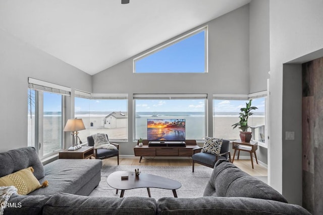 3903 Ocean Dr, Oxnard, CA 93035 - living area with wood finished floors and high vaulted ceiling