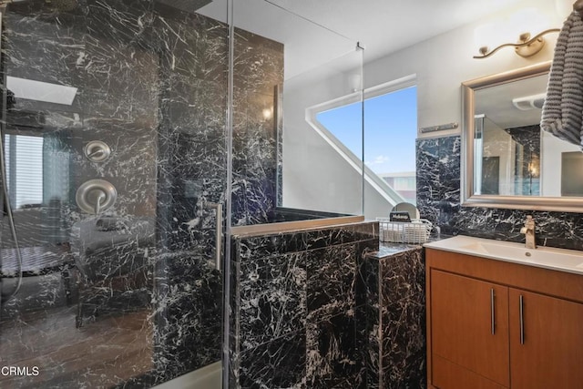 3903 Ocean Dr, Oxnard, CA 93035 - bathroom with a marble finish shower and vanity