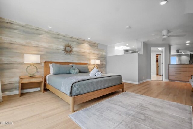 3903 Ocean Dr, Oxnard, CA 93035 - bedroom with wood finished floors and recessed lighting