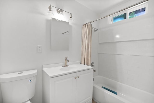 1520 Flanagan St, Pomona, CA 91766 - bathroom featuring shower / bath combo, toilet, and vanity