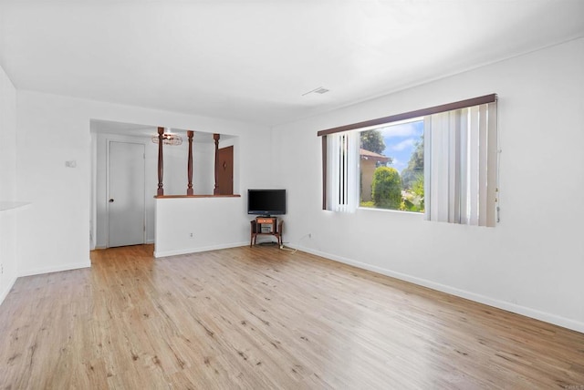 1520 Flanagan St, Pomona, CA 91766 - unfurnished living room with wood finished floors and baseboards