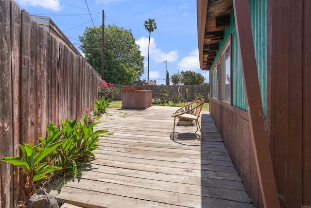 1520 Flanagan St, Pomona, CA 91766 - wooden deck featuring a fenced backyard