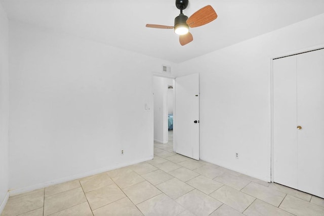1520 Flanagan St, Pomona, CA 91766 - unfurnished bedroom featuring light tile patterned flooring, a closet, a ceiling fan, and baseboards