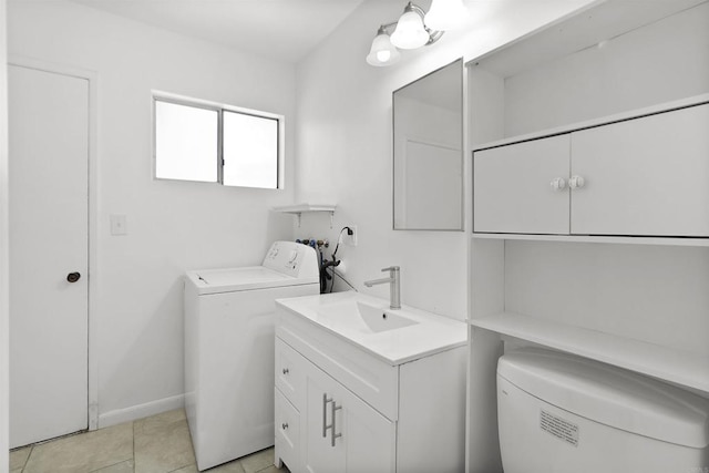 1520 Flanagan St, Pomona, CA 91766 - washroom featuring washer / dryer and baseboards