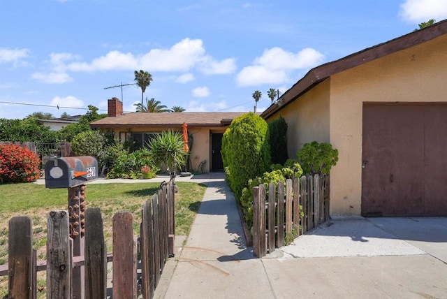 1520 Flanagan St, Pomona, CA 91766 - view of front of home with stucco siding and fence