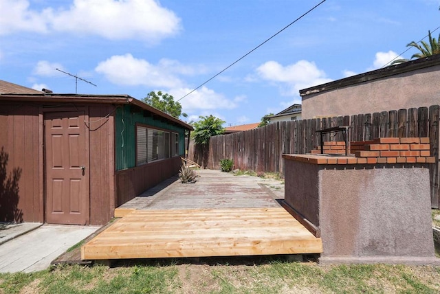 1520 Flanagan St, Pomona, CA 91766 - wooden deck featuring a fenced backyard