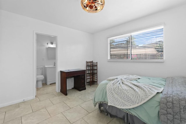 1520 Flanagan St, Pomona, CA 91766 - tiled bedroom with baseboards and ensuite bath