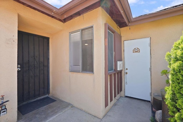 1520 Flanagan St, Pomona, CA 91766 - doorway to property with stucco siding