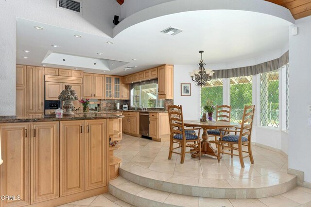 11616 E Las Posas Rd, Camarillo, CA 93012 - kitchen featuring light tile patterned floors, a chandelier, recessed lighting, glass insert cabinets, and baseboards