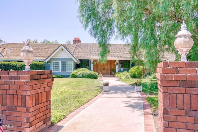 11616 E Las Posas Rd, Camarillo, CA 93012 - view of front facade with a front lawn and a chimney
