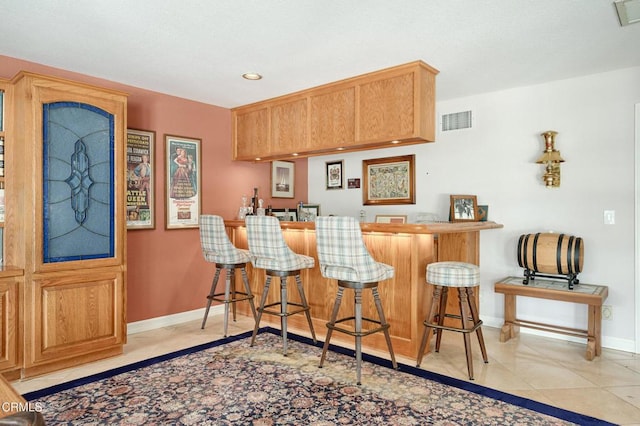 11616 E Las Posas Rd, Camarillo, CA 93012 - indoor wet bar featuring tile patterned floors, baseboards, and recessed lighting